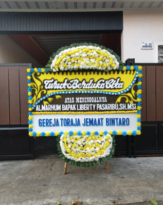 Papan Bunga Duka di Dangerakko